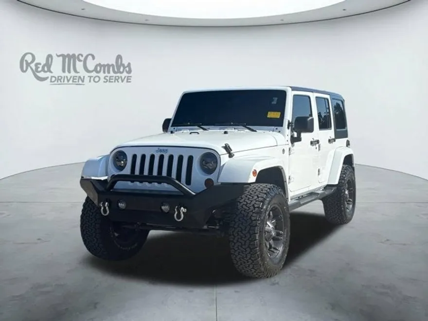 2013 Jeep Wrangler Unlimited Sahara photo 1