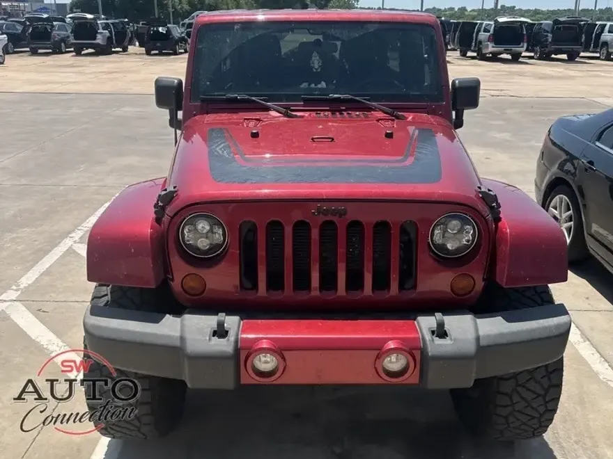 2012 Jeep Wrangler Unlimited Sahara Altitude photo 1