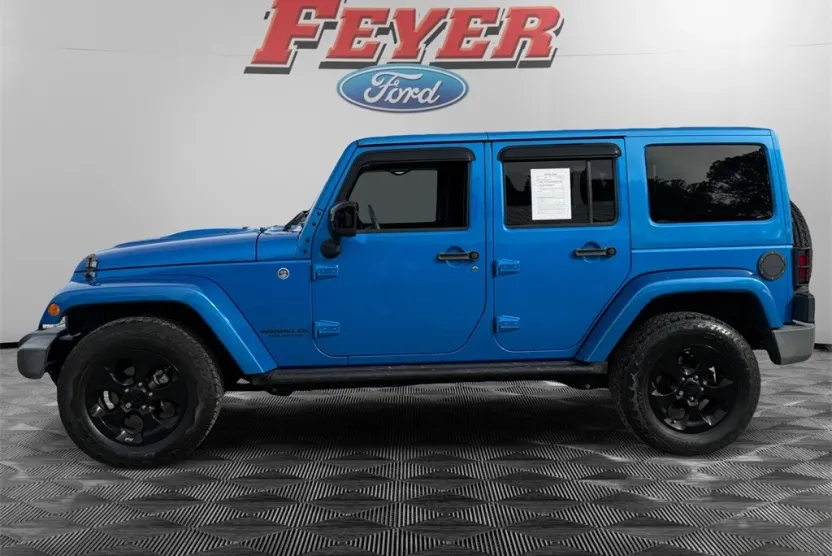 2015 Jeep Wrangler Unlimited Sahara Altitude photo 1