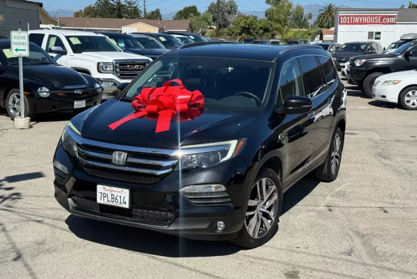 2016 Honda Pilot Touring Sport photo 1