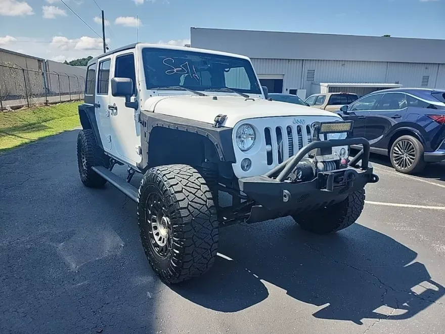 2014 Jeep Wrangler Unlimited Sahara photo 1