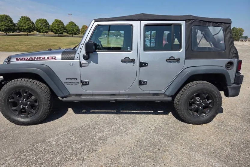 2014 Jeep Wrangler Unlimited Sport photo 1