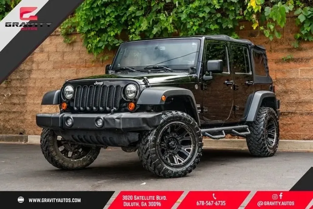 2013 Jeep Wrangler Unlimited Sport photo 1