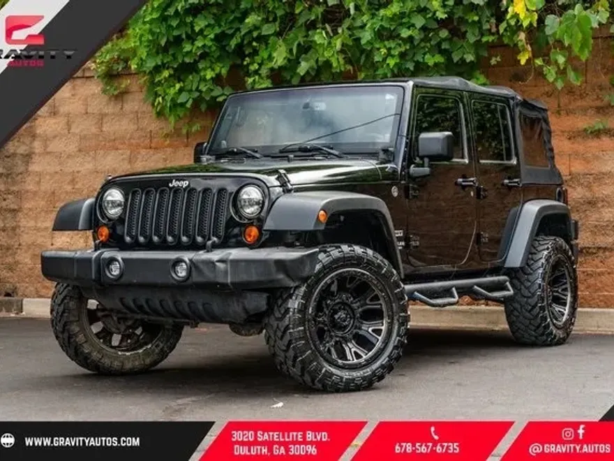 2013 Jeep Wrangler Unlimited Sport photo 1