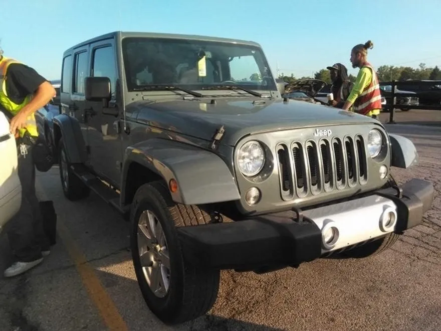2014 Jeep Wrangler Unlimited Sahara photo 1