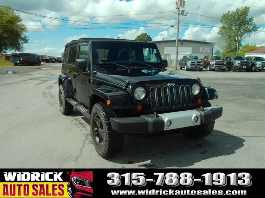 2013 Jeep Wrangler Unlimited Sahara photo 1