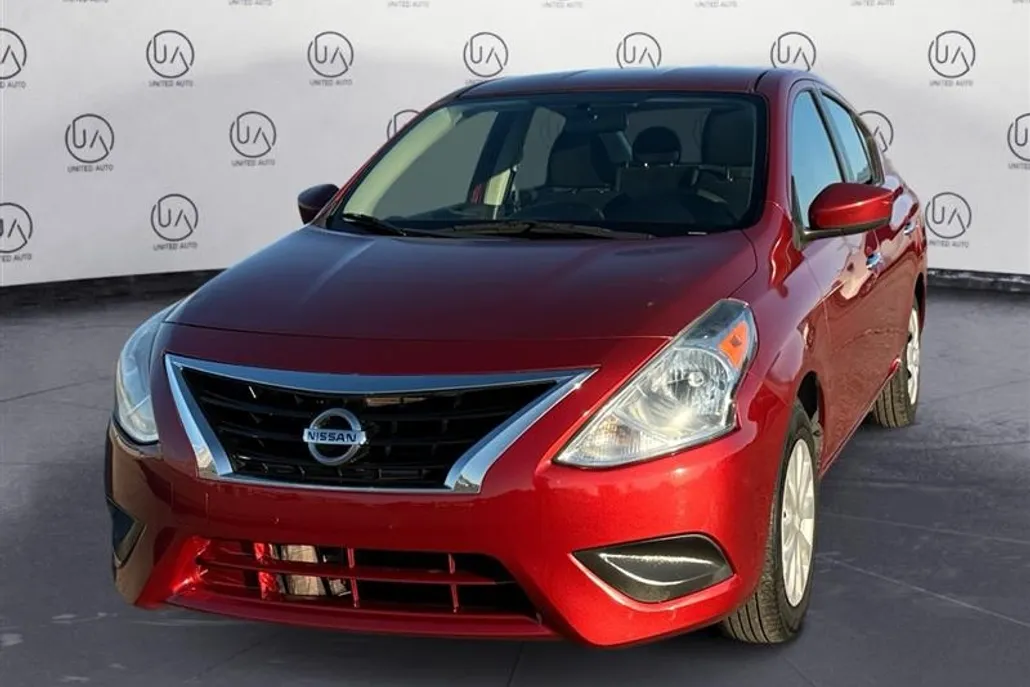 2016 Nissan Versa Plus SL SV photo 1