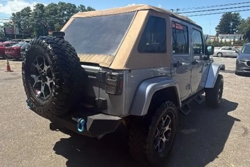 2016 Jeep Wrangler Unlimited Sahara Sport photo 1