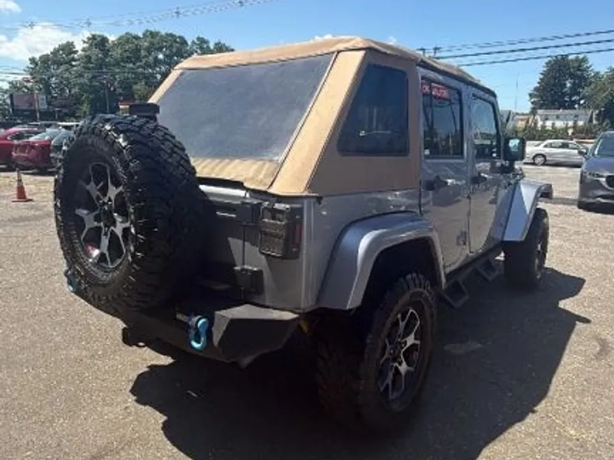 2016 Jeep Wrangler Unlimited Sahara Sport photo 1