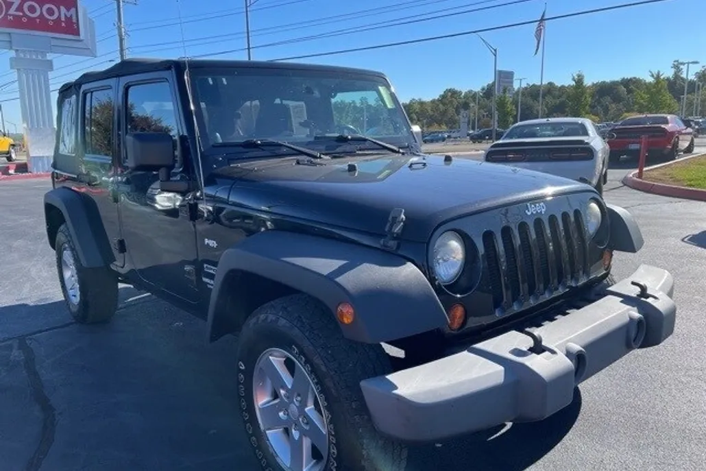 2013 Jeep Wrangler Unlimited Sport photo 1