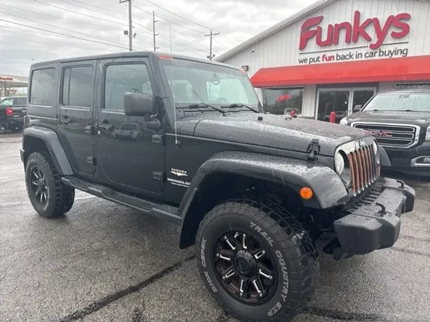 2013 Jeep Wrangler Unlimited Sahara photo 1