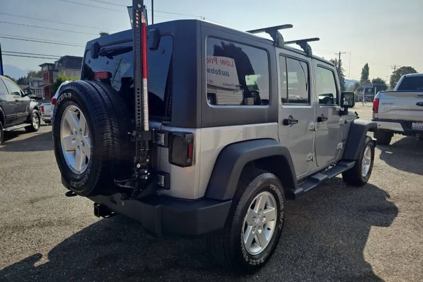 2014 Jeep Wrangler Unlimited Sport photo 1