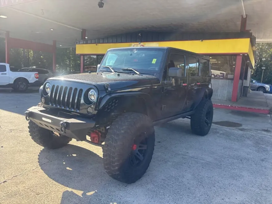2013 Jeep Wrangler Unlimited Sahara photo 1