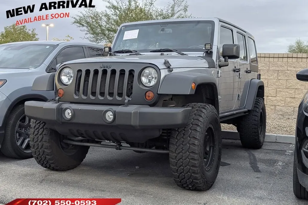 2013 Jeep Wrangler Unlimited Sport photo 1