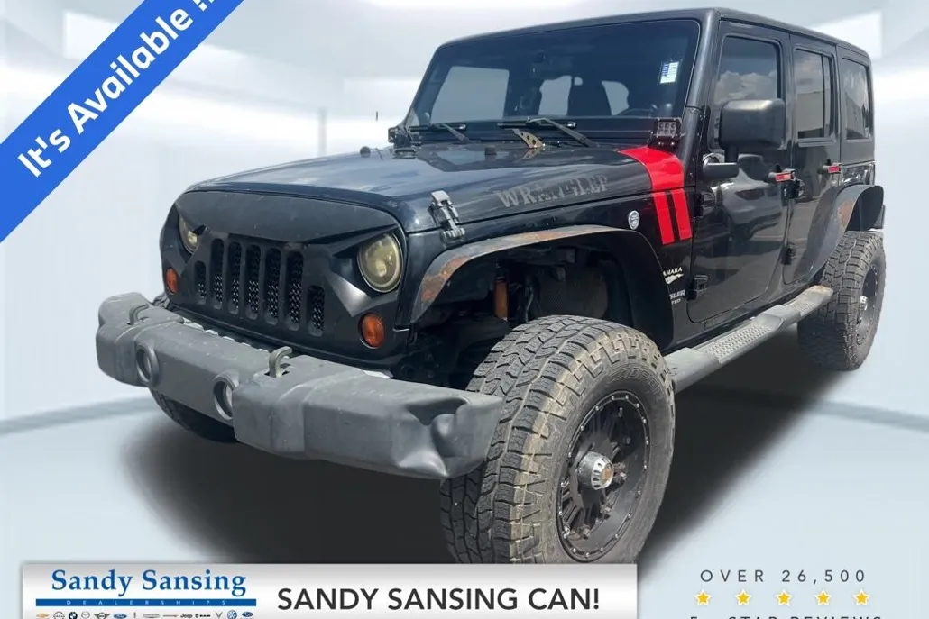 2011 Jeep Wrangler Unlimited Sahara photo 1