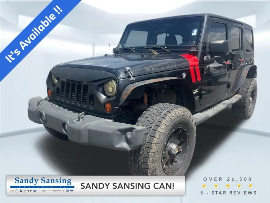 2011 Jeep Wrangler Unlimited Sahara photo 1