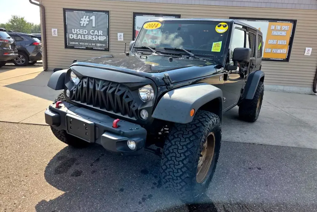 2014 Jeep Wrangler Unlimited Sahara photo 1