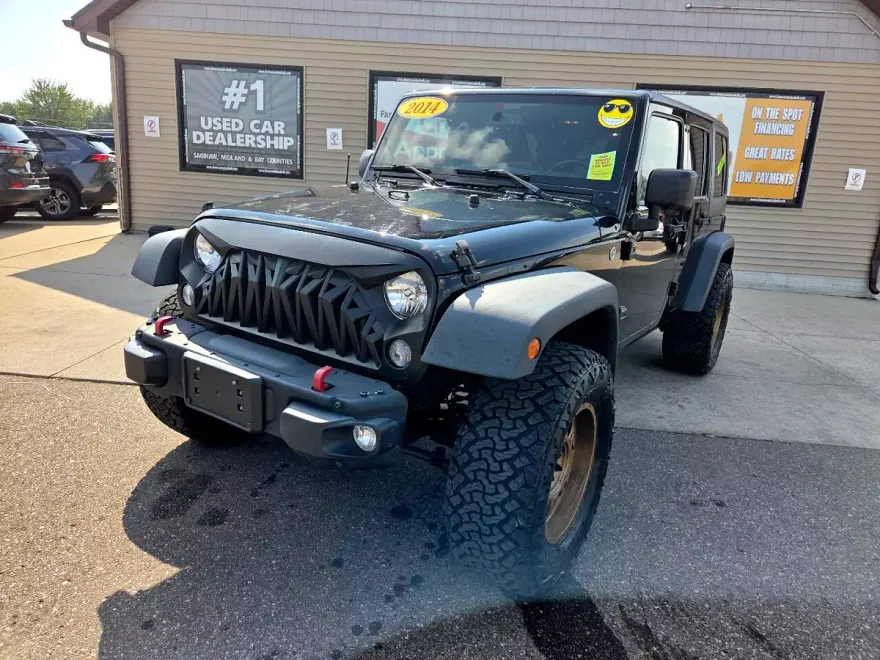 2014 Jeep Wrangler Unlimited Sahara photo 1