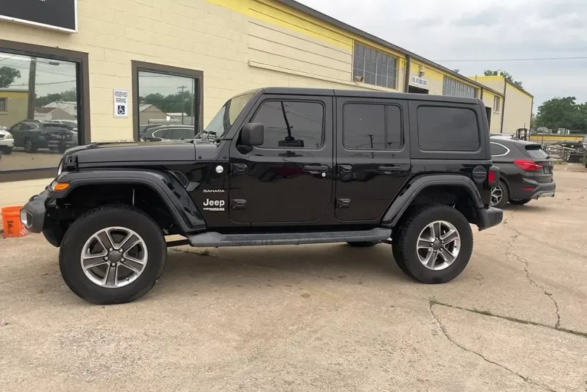2019 Jeep Wrangler Unlimited Sahara Sport photo 1