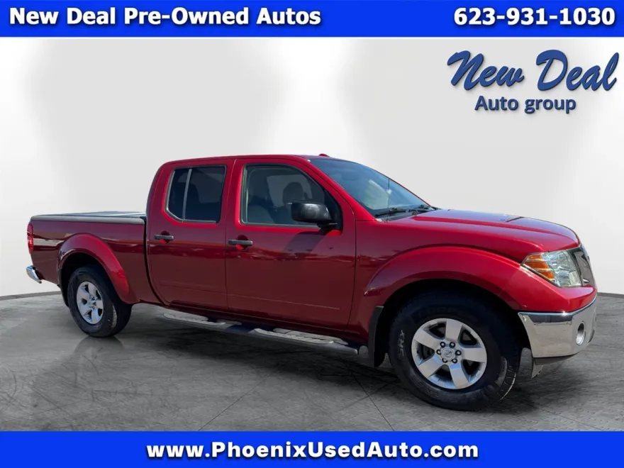 2011 Nissan Frontier Crew Cab LE photo 1