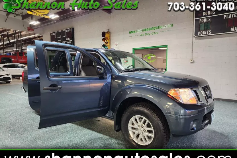 2014 Nissan Frontier Crew Cab SV photo 1