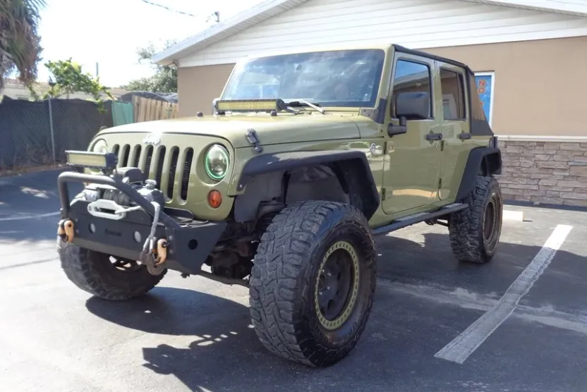 2013 Jeep Wrangler Unlimited Sport photo 1