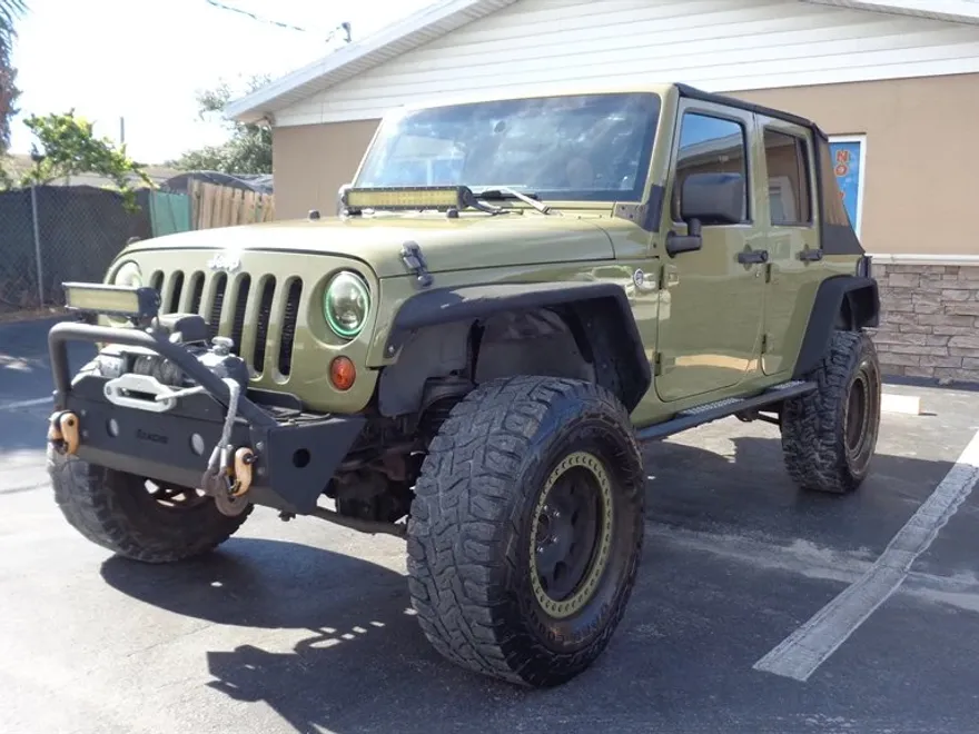 2013 Jeep Wrangler Unlimited Sport photo 1