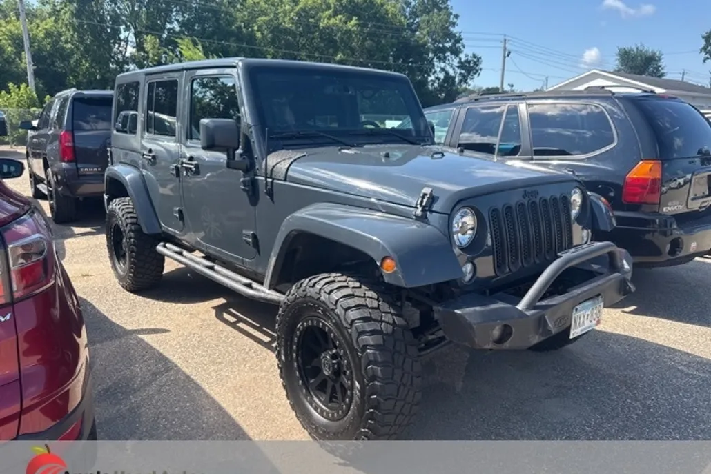2016 Jeep Wrangler Unlimited Sahara photo 1