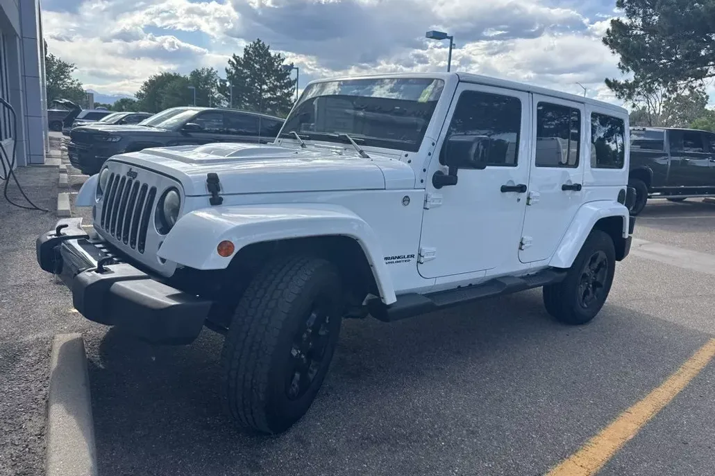 2015 Jeep Wrangler Unlimited Sahara Altitude photo 1