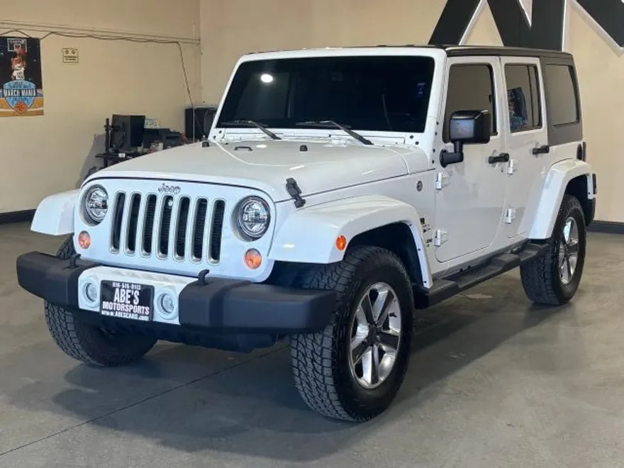2016 Jeep Wrangler Unlimited Sahara Sport photo 1