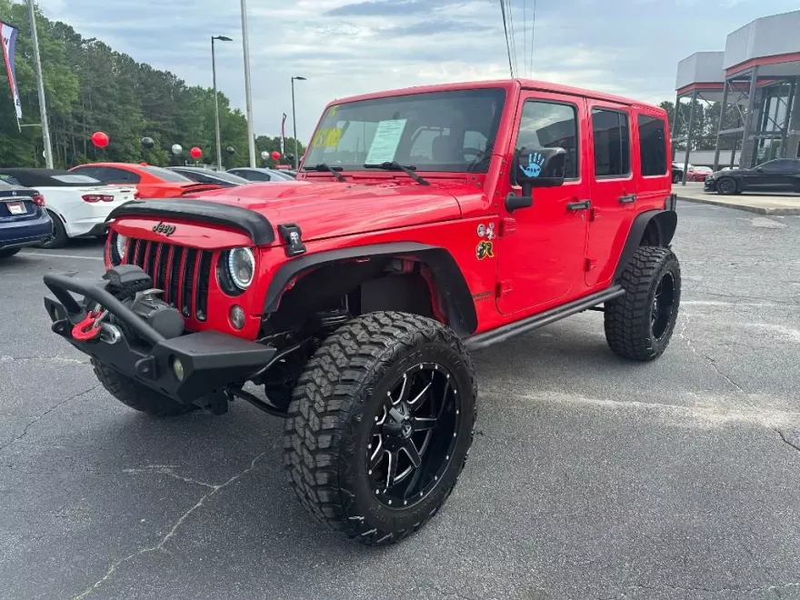 2015 Jeep Wrangler Unlimited Sahara Altitude photo 1