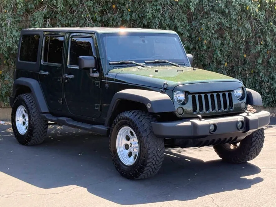 2011 Jeep Wrangler Unlimited X photo 1