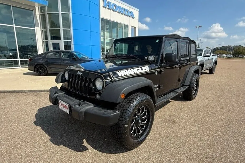 2014 Jeep Wrangler Unlimited Sport photo 1