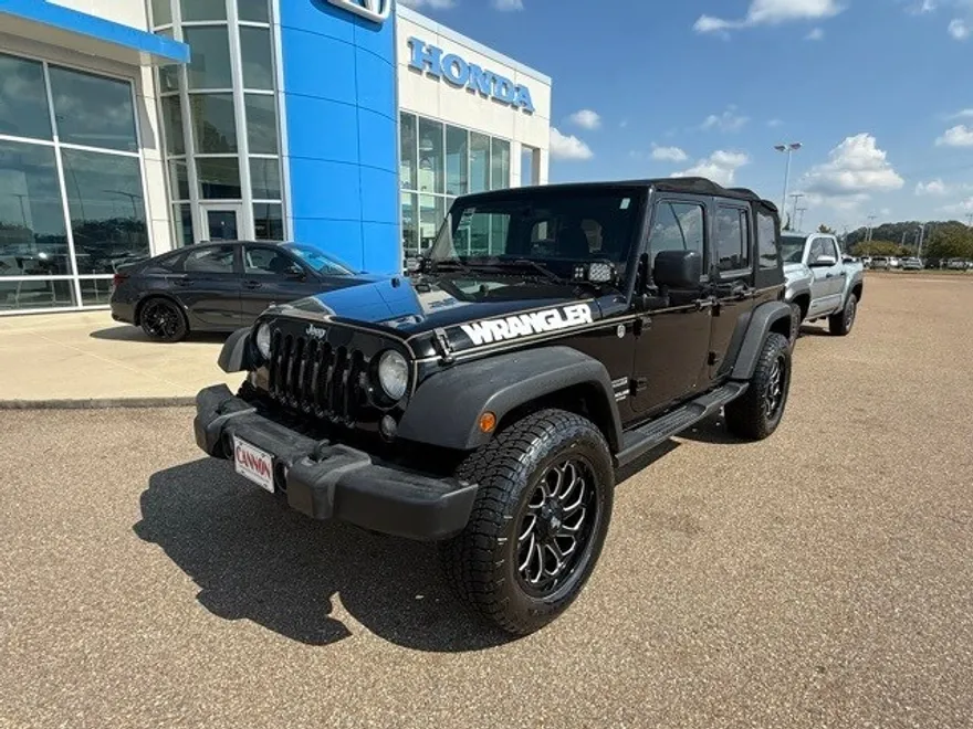 2014 Jeep Wrangler Unlimited Sport photo 1
