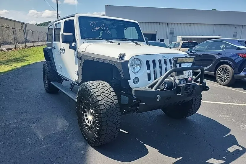 2014 Jeep Wrangler Unlimited Sahara photo 1