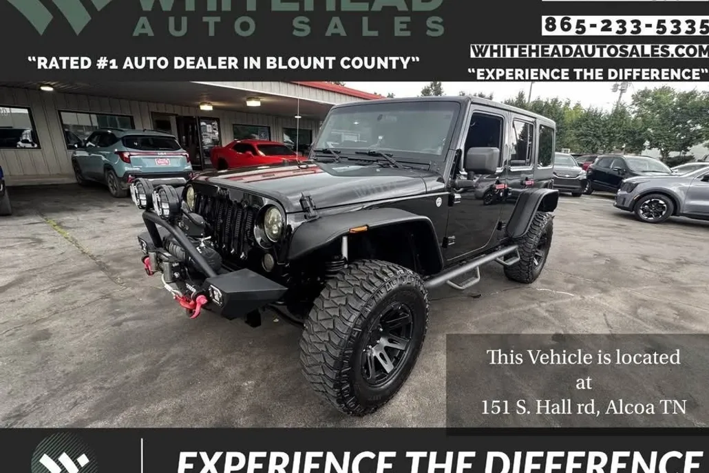 2014 Jeep Wrangler Unlimited Sport photo 1
