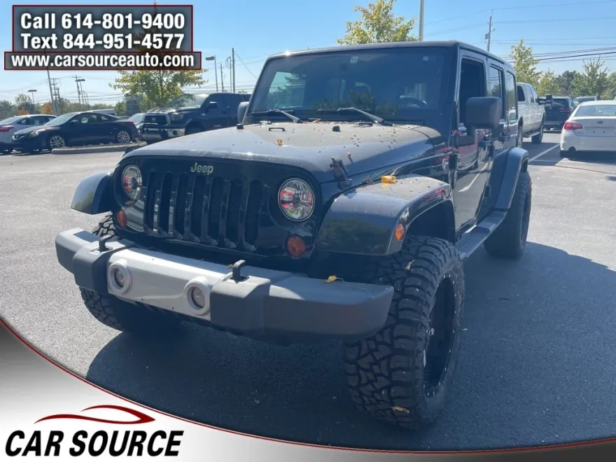 2013 Jeep Wrangler Unlimited Sahara photo 1