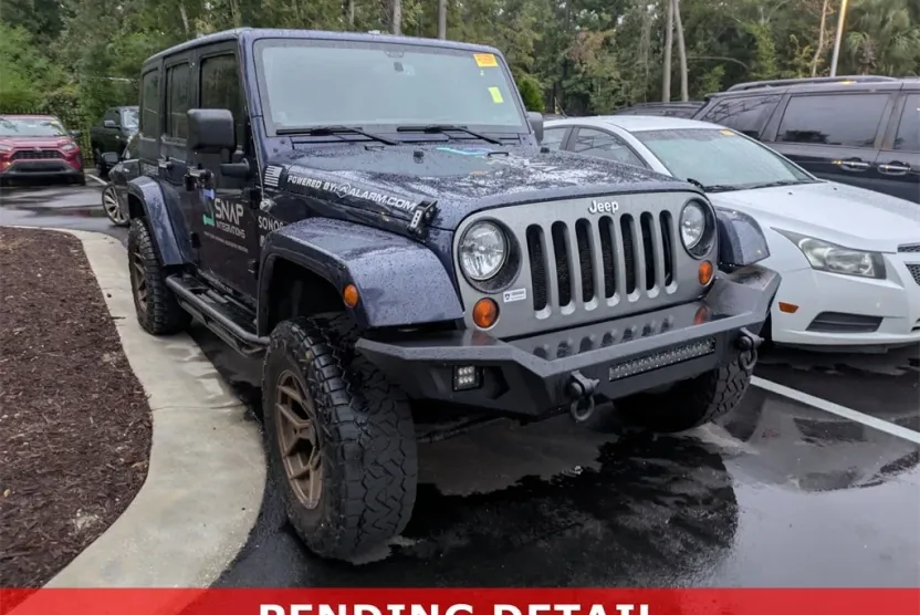 2013 Jeep Wrangler Unlimited Freedom photo 1