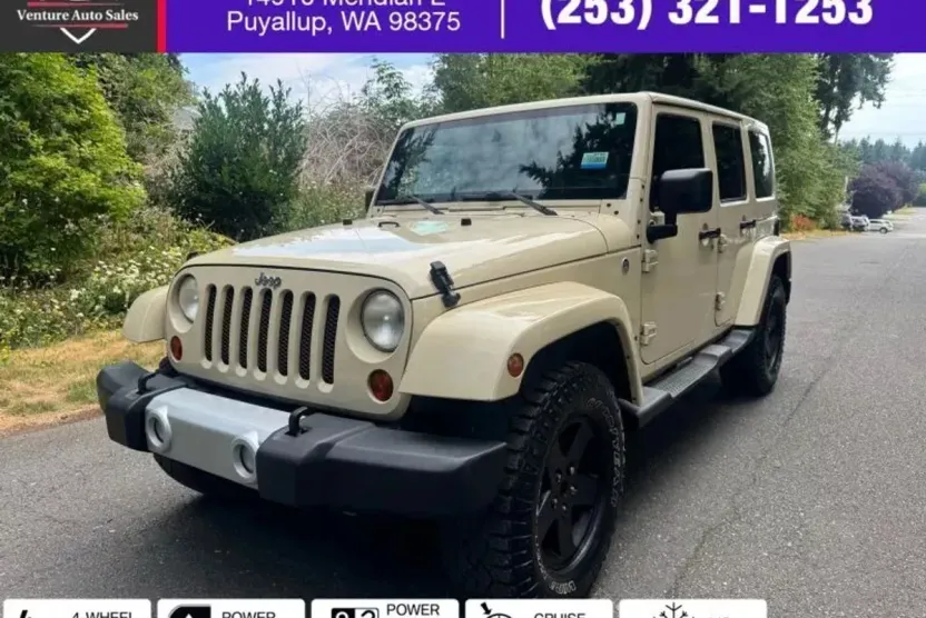 2012 Jeep Wrangler Unlimited Sahara Sport photo 1