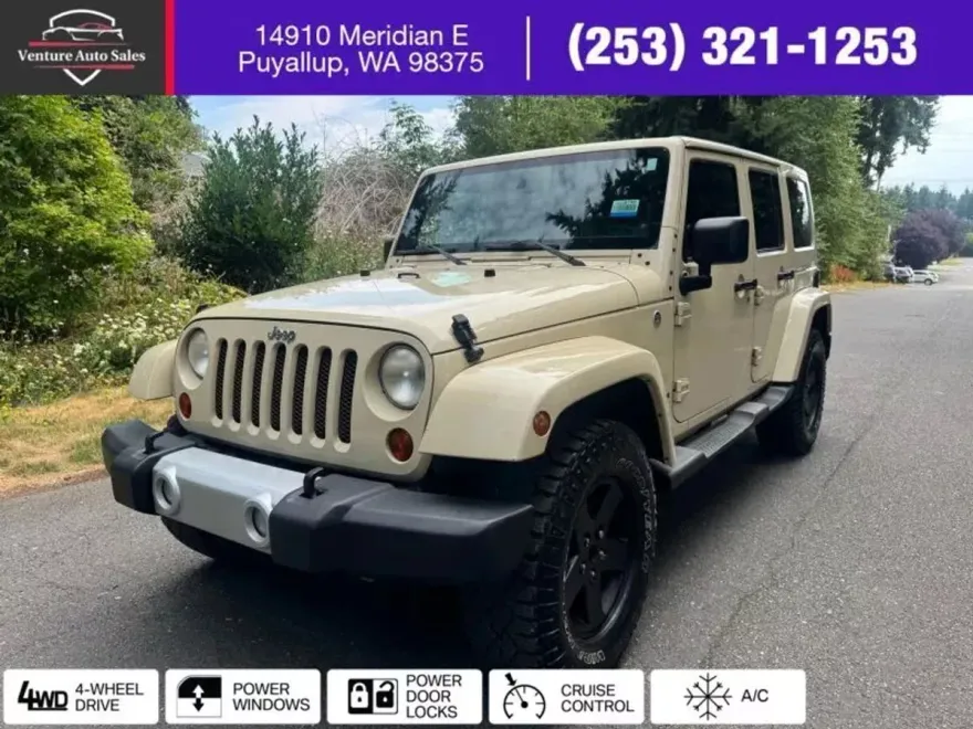 2012 Jeep Wrangler Unlimited Sahara Sport photo 1