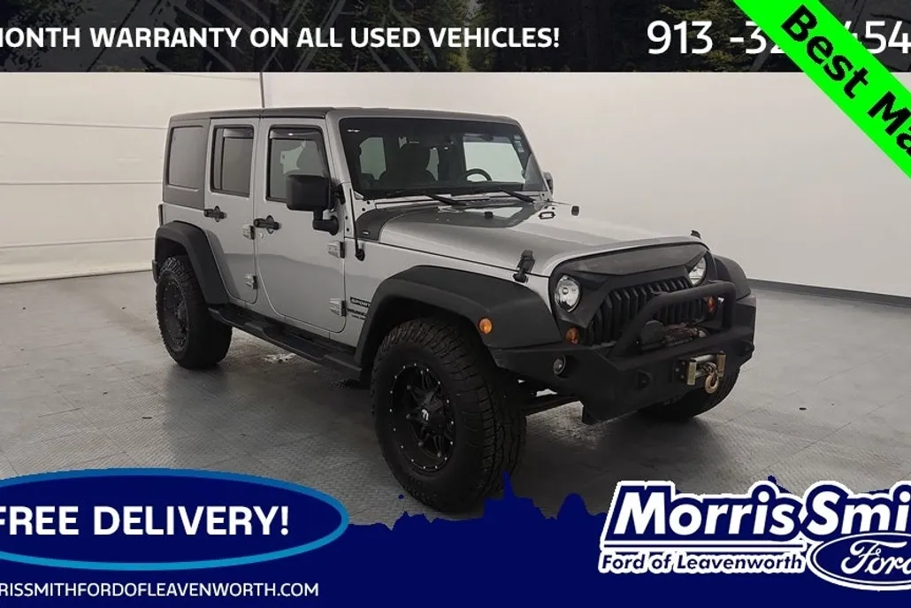 2013 Jeep Wrangler Unlimited Sport photo 1
