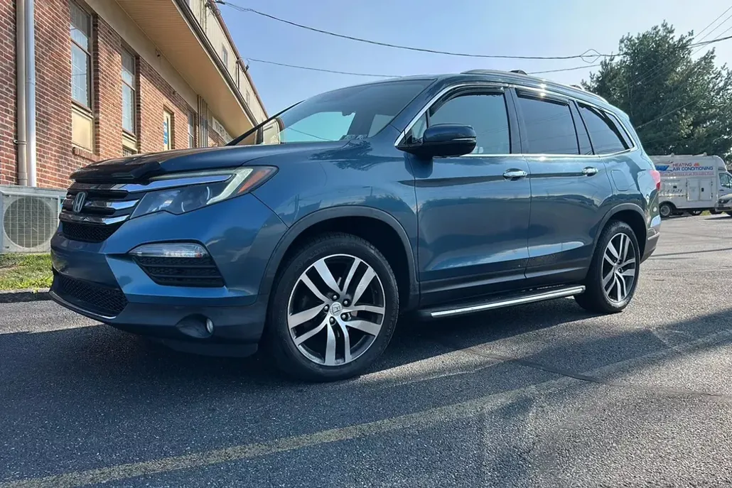 2016 Honda Pilot Touring Sport photo 1
