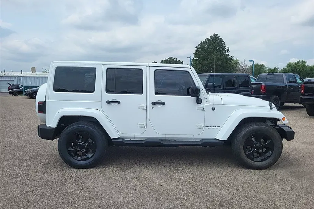 2015 Jeep Wrangler Unlimited Sahara Altitude photo 1