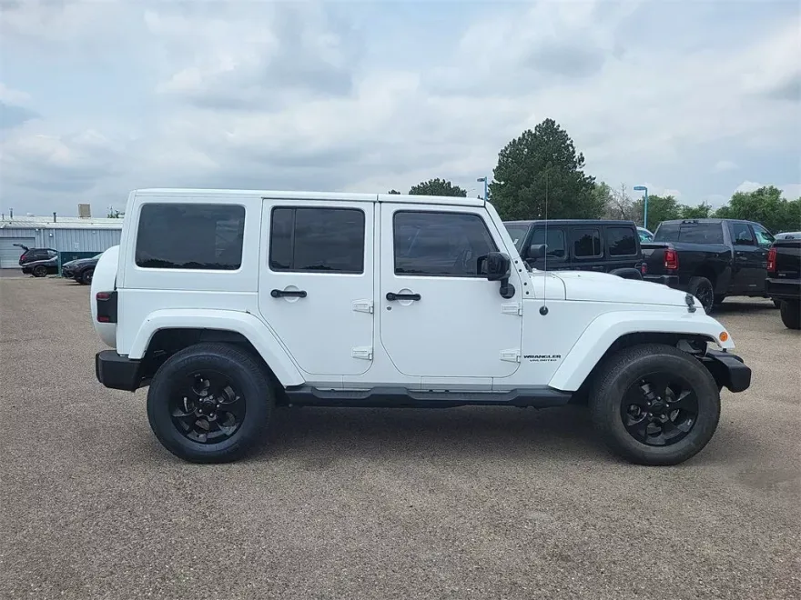 2015 Jeep Wrangler Unlimited Sahara Altitude photo 1