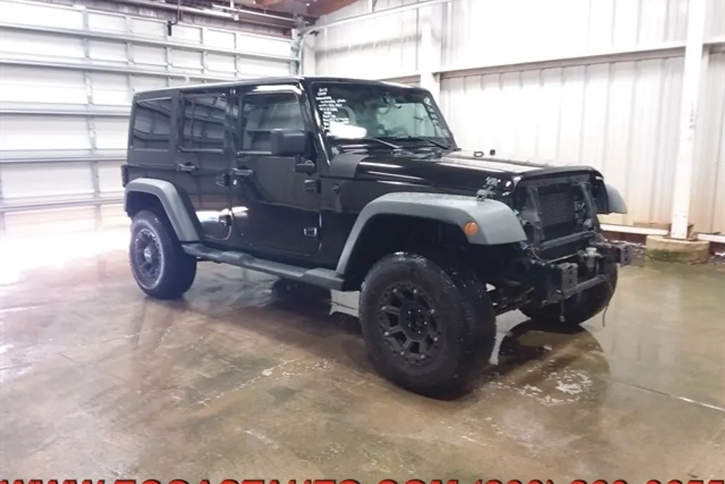 2013 Jeep Wrangler Unlimited Sport photo 1
