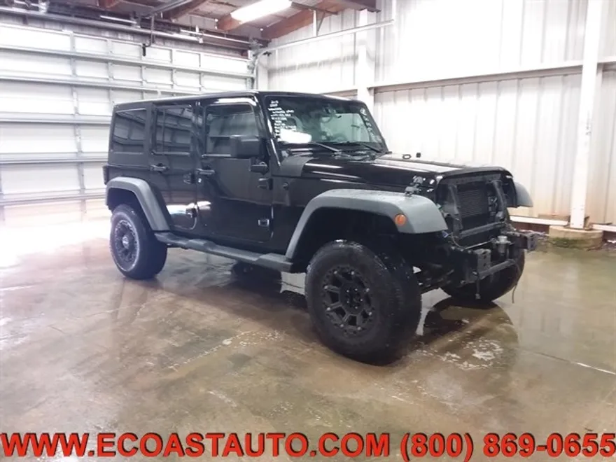 2013 Jeep Wrangler Unlimited Sport photo 1