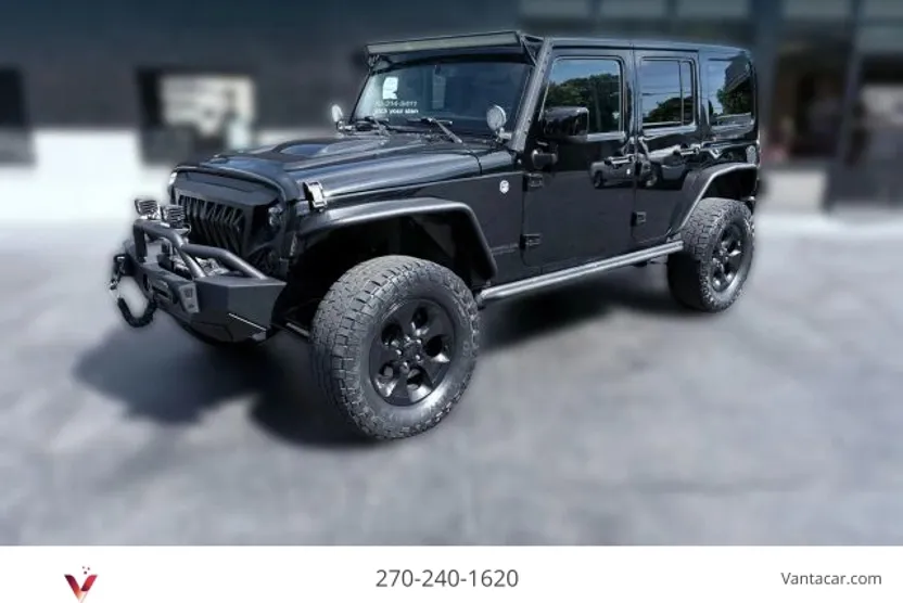 2015 Jeep Wrangler Unlimited Altitude Sport photo 1