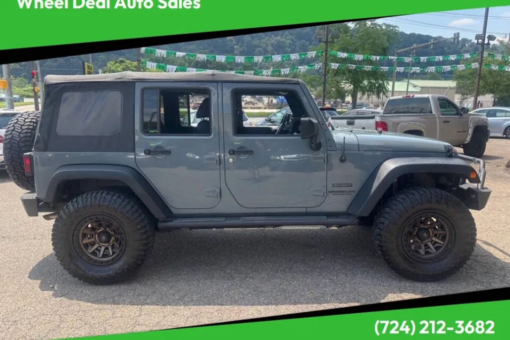 2014 Jeep Wrangler Unlimited Sport photo 1