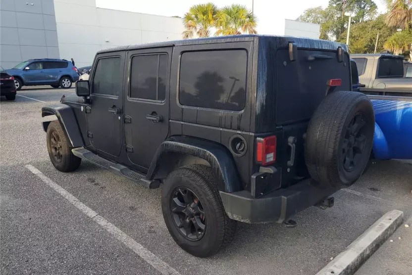 2013 Jeep Wrangler Unlimited Sahara photo 1