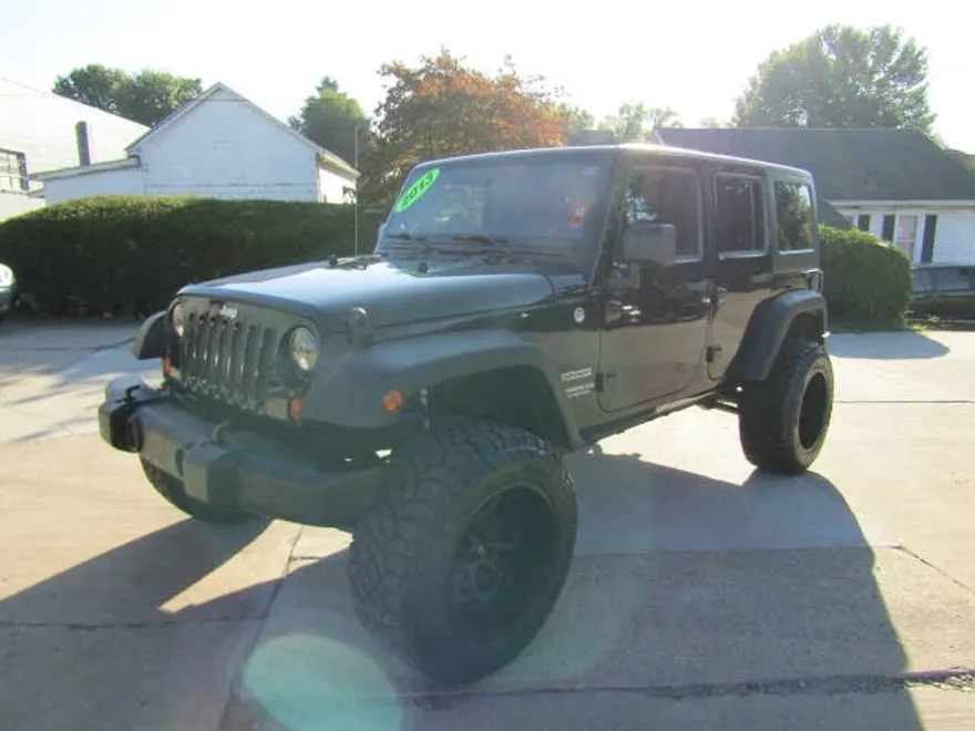 2013 Jeep Wrangler Unlimited Sport photo 1